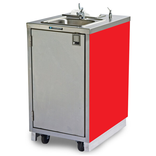 A stainless steel Lakeside portable sink with a red surface.