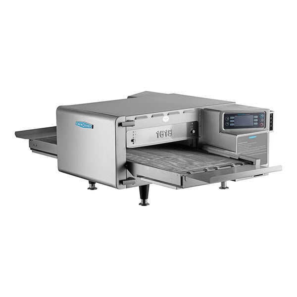 A TurboChef electric countertop conveyor oven on a counter in a deli.