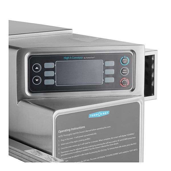 A TurboChef electric countertop conveyor oven with a digital display.
