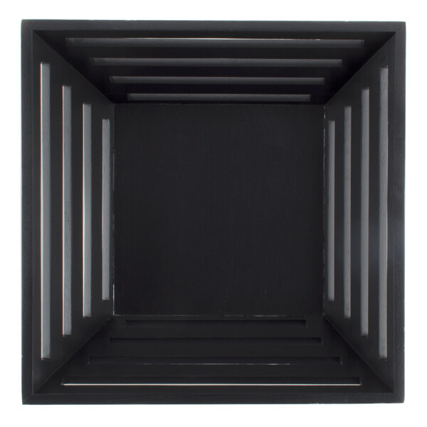 A black square tapered birch bread basket with metal bars.