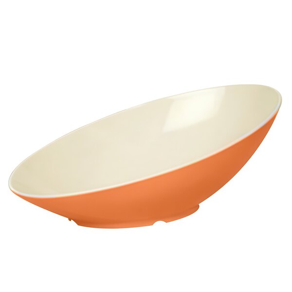 A white oval melamine bowl with an orange slanted rim.