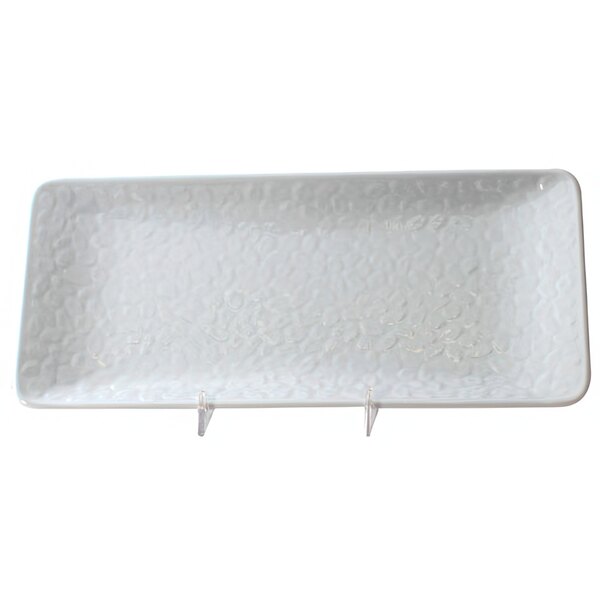 A close-up of a Thunder Group Classic White rectangular melamine plate with a textured white surface.