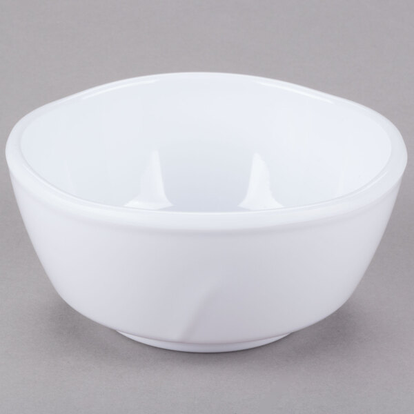 A white Thunder Group melamine bowl with a small rim on a gray surface.