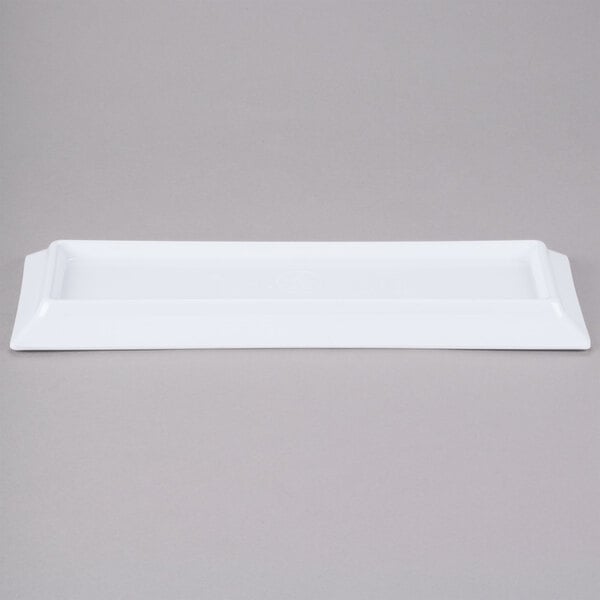 A white rectangular Thunder Group melamine plate.