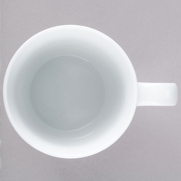 A white 10 Strawberry Street Swing porcelain mug with a C-handle.