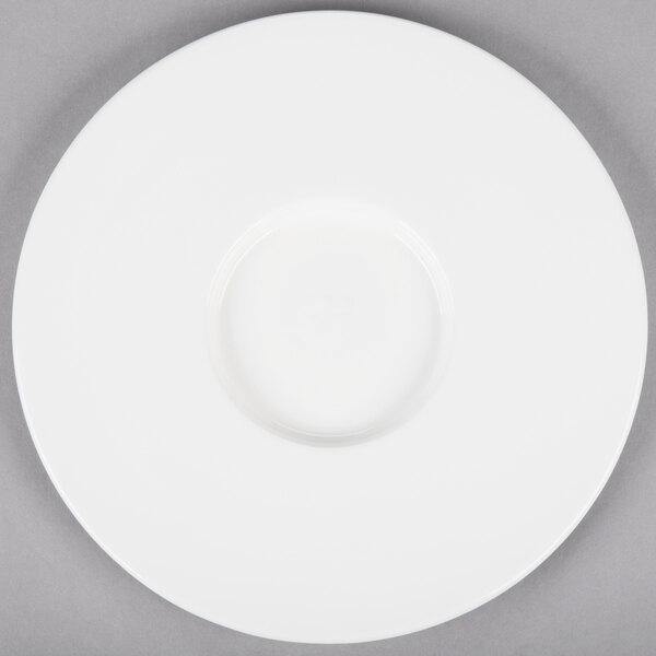 A 10 Strawberry Street Whittier white porcelain plate with a circular rim.