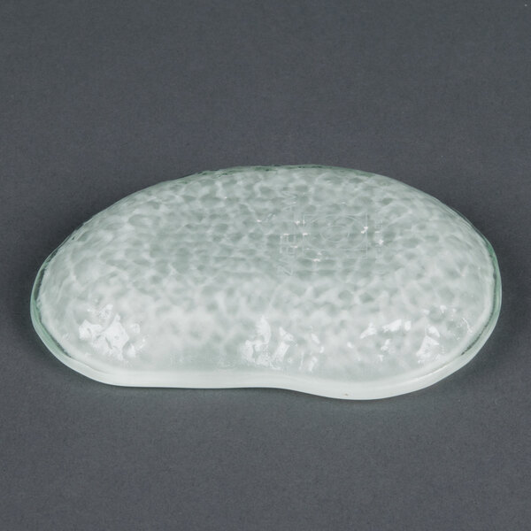 A clear opal glass eliptical dish with a small hole in it.