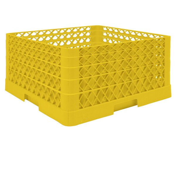 A yellow plastic Vollrath glass rack with grids.