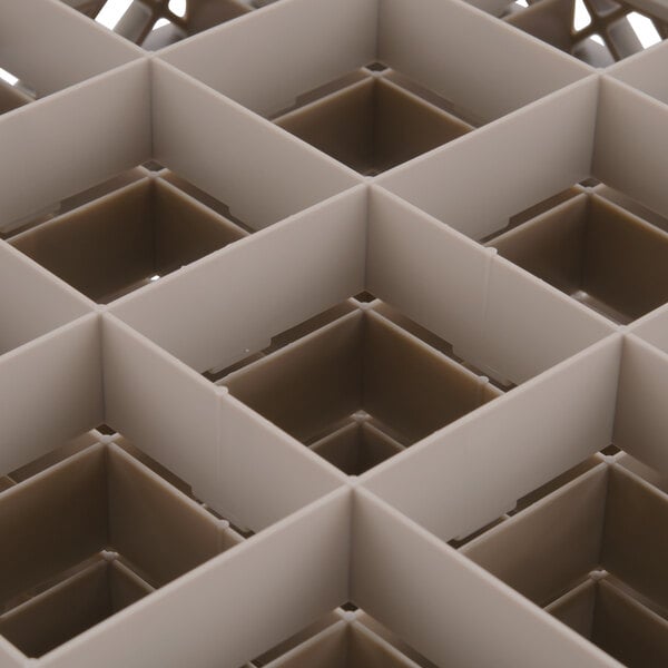 A white plastic grid with square compartments.