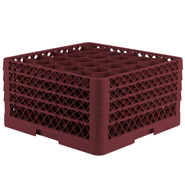 A large red plastic Vollrath Traex glass rack with holes.