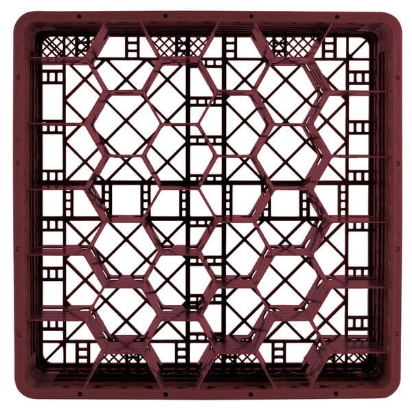 A red Vollrath Traex rack with hexagon compartments.