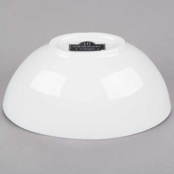 A white 10 Strawberry Street Royal oval porcelain bowl with a label.