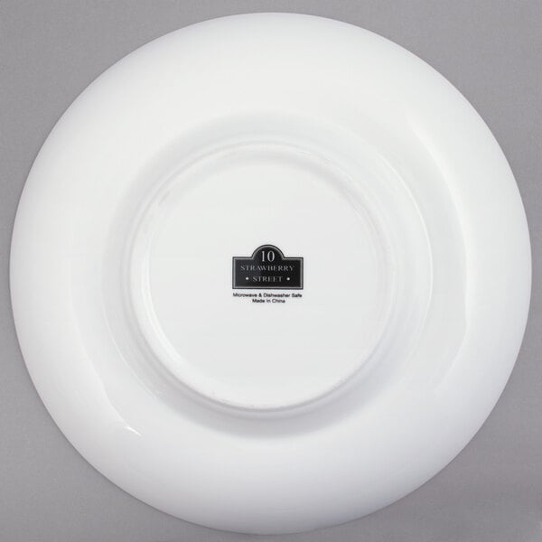 A white Tao bowl with a black label on it.