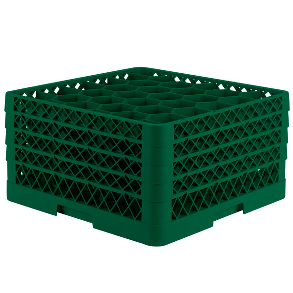 A green plastic Vollrath Traex glass rack with holes.