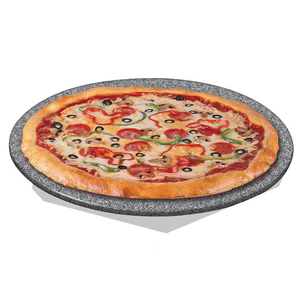 A pizza on a Hatco heated stone shelf with pepperoni and olives.