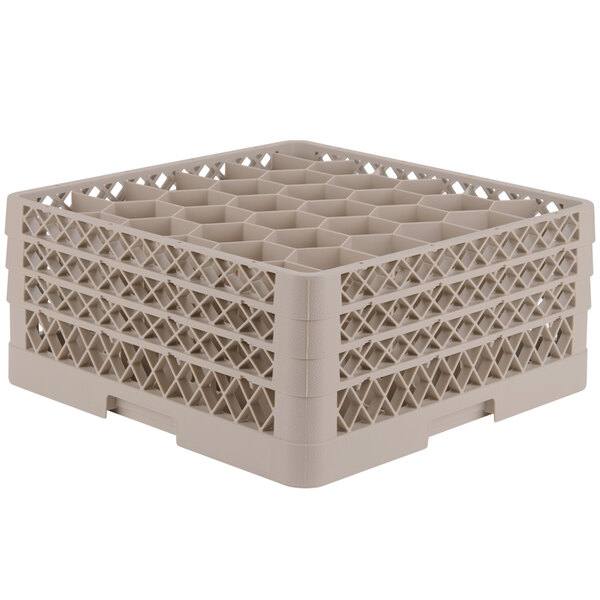 A beige plastic Vollrath Traex glass rack with 30 compartments.