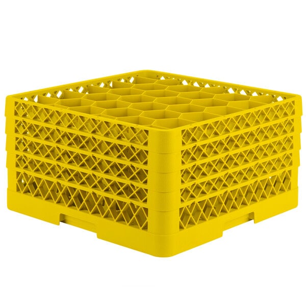 A yellow plastic Vollrath Traex glass rack with 30 compartments for small items.