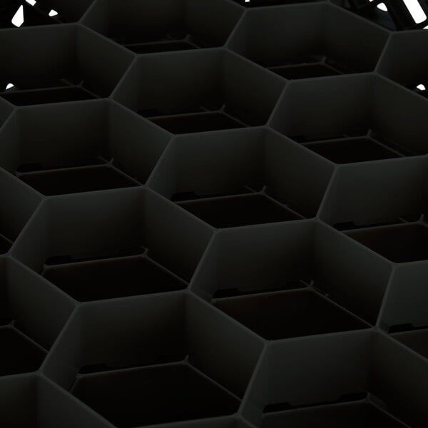 A black hexagon shaped Vollrath Traex glass rack.