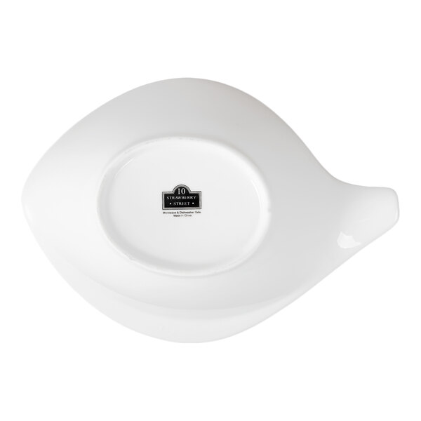 An 8 oz. white porcelain handled tail bowl from 10 Strawberry Street.