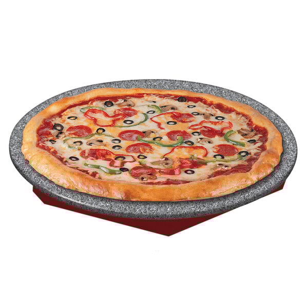 A pizza with pepperoni and olives on a Hatco heated stone shelf.