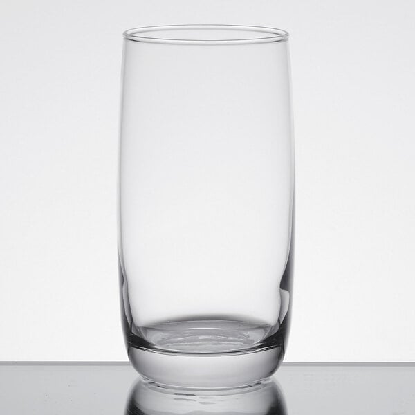 An Arcoroc Cabernet cooler glass on a reflective surface.