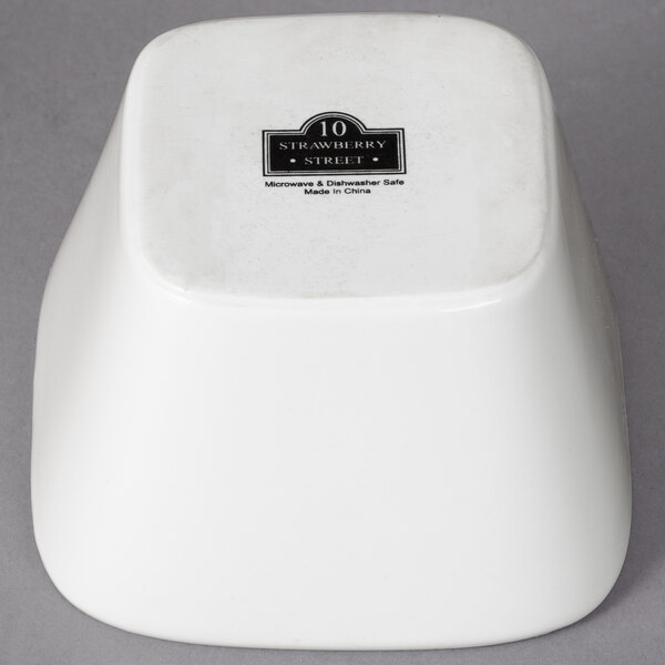 A white square 10 Strawberry Street Whittier china bowl with black text.