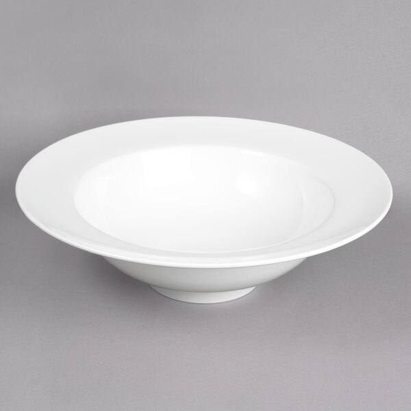 A white 10 Strawberry Street Whittier porcelain rim soup bowl.