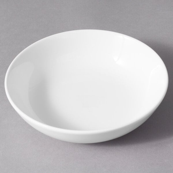 A 10 Strawberry Street white porcelain sauce dish.