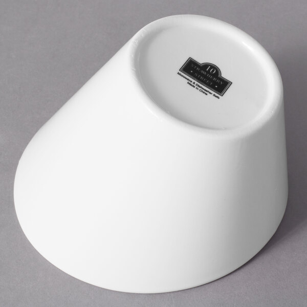 A white bowl with a black label.