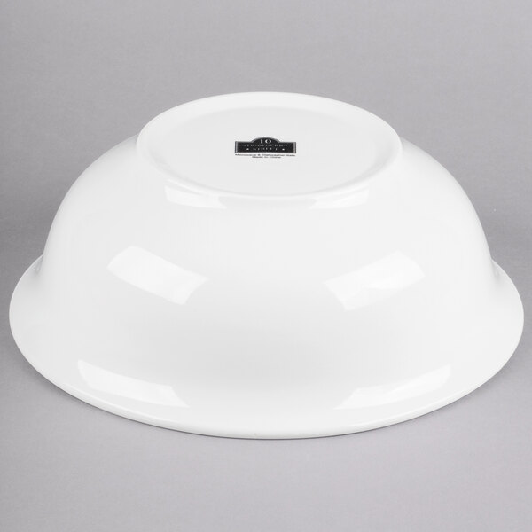 A 10 Strawberry Street Whittier white serving bowl on a gray background.