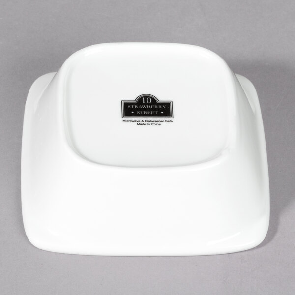 A white square porcelain bowl with Whittier text in black.
