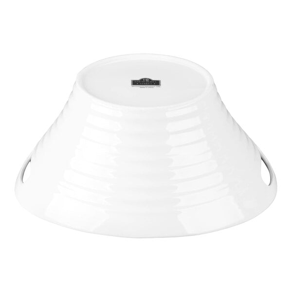 A large white porcelain deep bowl with handles, shown upside down.