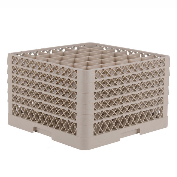 A beige Vollrath Traex glass rack with 36 compartments in a plastic basket with holes.