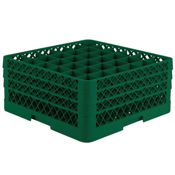 A green plastic Vollrath Traex glass rack with 36 compartments.