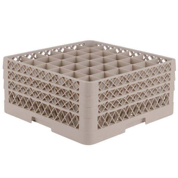 A beige Vollrath Traex glass rack with many compartments.