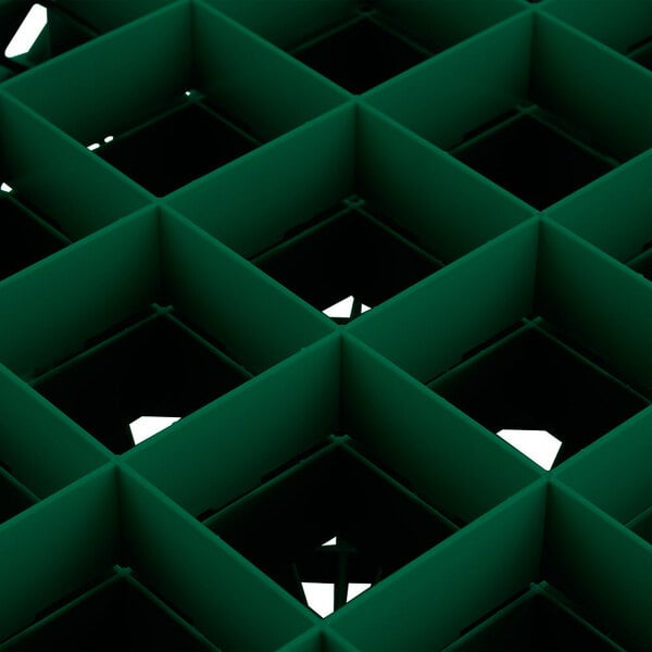 A green plastic grid with holes.