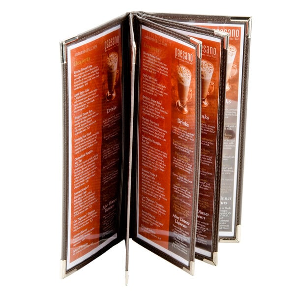 A brown leather-like menu cover with orange stitching and gold corners.