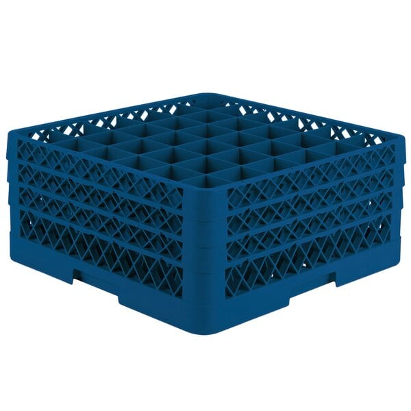 A Vollrath Traex royal blue plastic rack with 36 cylindrical compartments with holes.