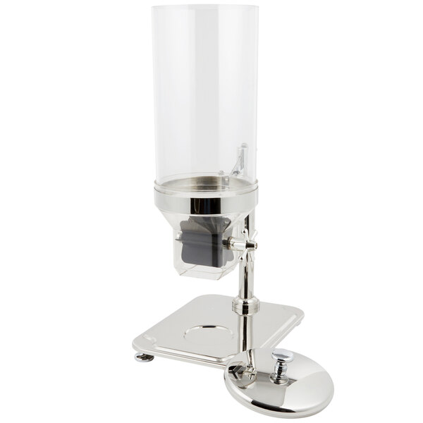 A Vollrath single canister cereal dispenser with a clear glass cylinder on a silver stand.