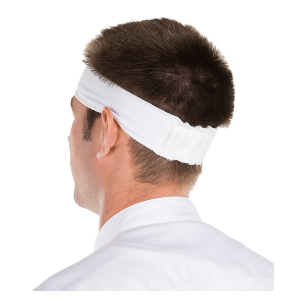 A person is shown from behind wearing a white fabric headband and a white collared shirt.