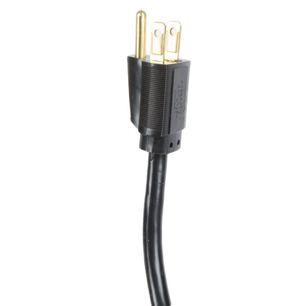 A close up of a black electrical cord with gold connectors.