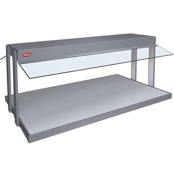 A grey granite Hatco buffet warmer with glass top shelves.
