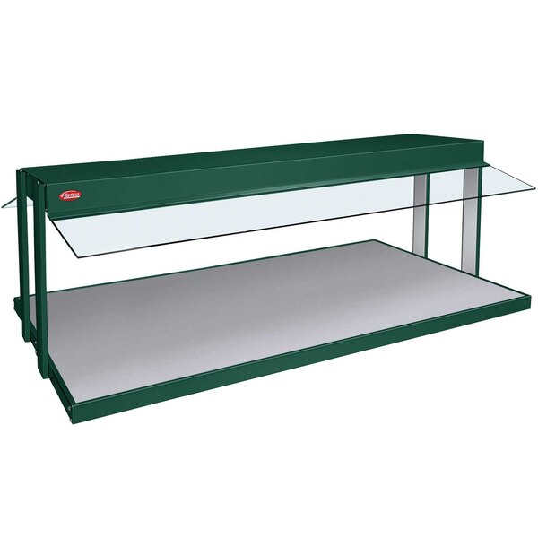 A green and white Hatco countertop buffet warmer shelf with glass shelves.