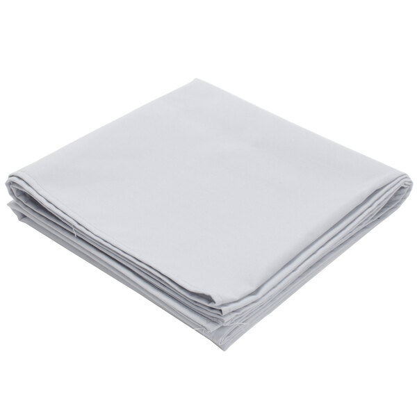 A stack of folded gray rectangular Intedge table covers.