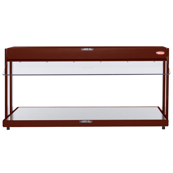 A rectangular brown Hatco buffet warmer with glass shelves.