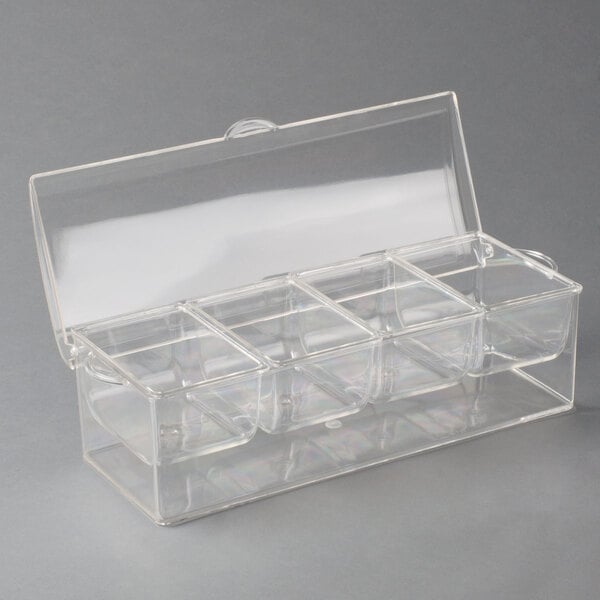 An American Metalcraft clear plastic condiment bar with four compartments and a lid.