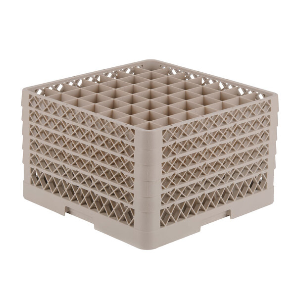 A beige plastic Vollrath Traex glass rack with many small compartments.