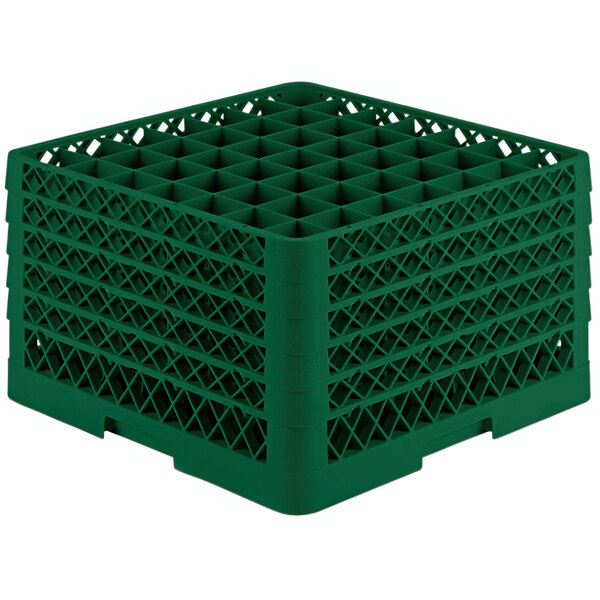 A green plastic Vollrath Traex glass rack with many compartments and holes.