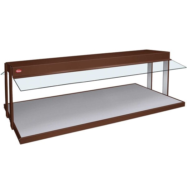 A brown rectangular Hatco buffet warmer with a glass top.
