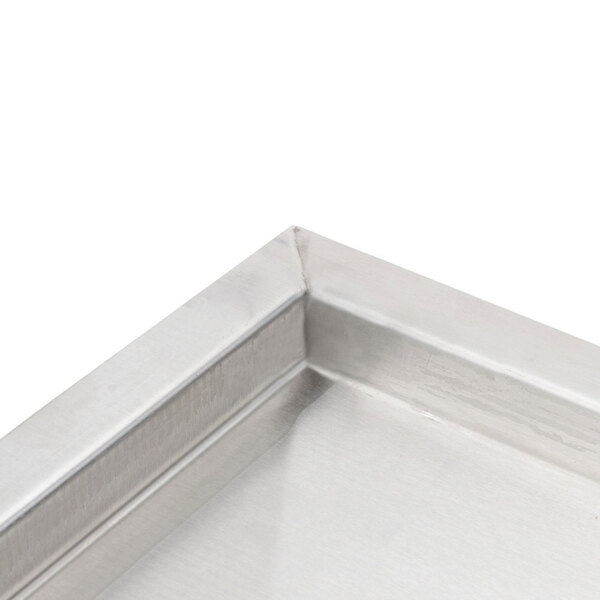 A stainless steel tank cover with a square edge for a Cooking Performance Group countertop fryer.